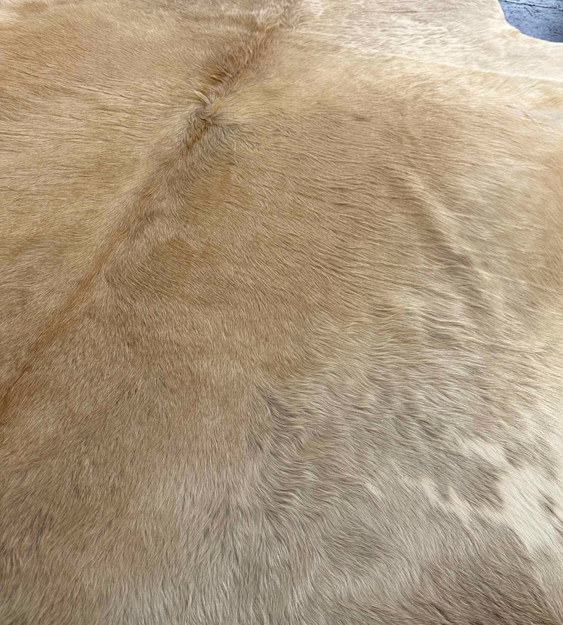brown cowhide rug