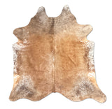Brown cowhide rug on a white background