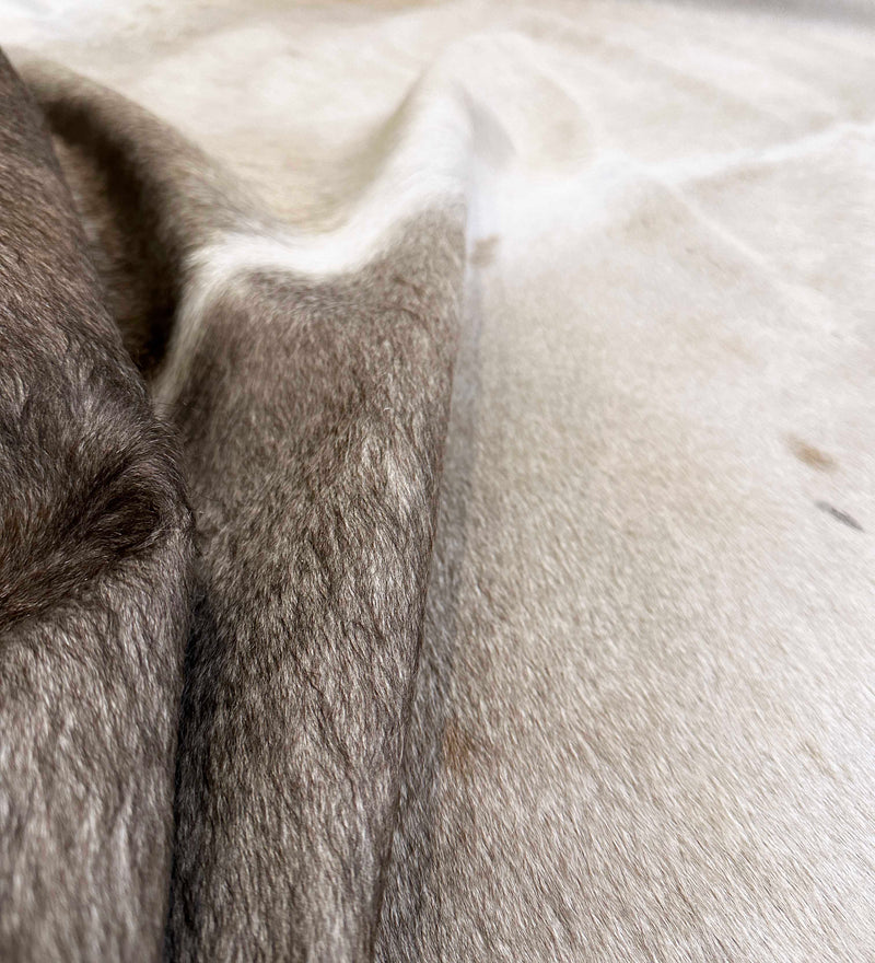 gray white cowhide rug