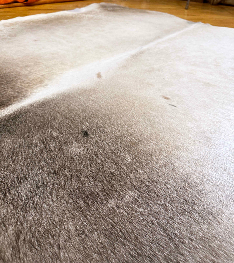 gray white cowhide rug