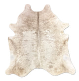 Cowhide rug with a natural pattern on a white background