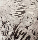 Detail of zebra serigraph pattern applied to genuine gray cowhide