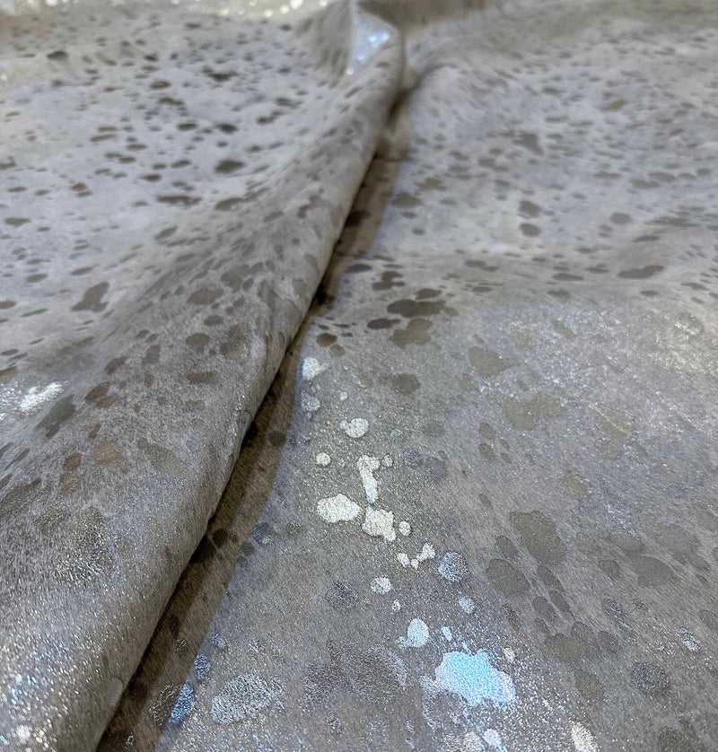 metallic silver cowhide rug