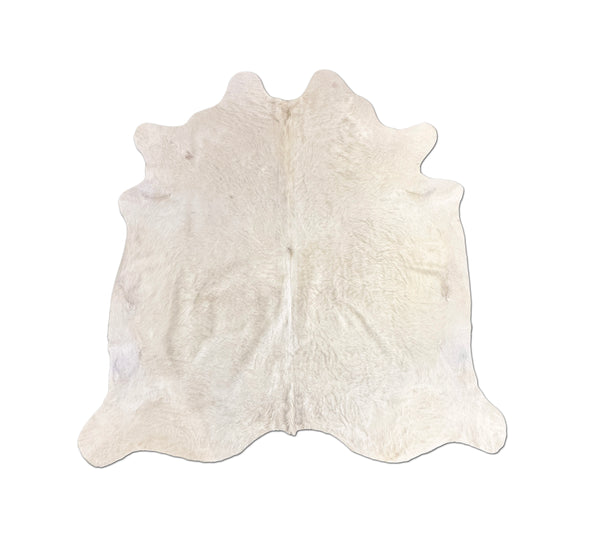 white cowhide rug