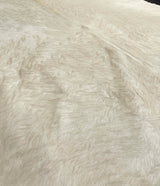 white cowhide rug