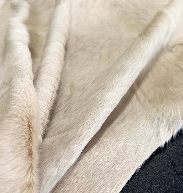 white cowhide rug