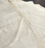 white cowhide rug