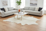 white cowhide rug in modern living room