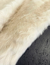 shaggy white cowhide
