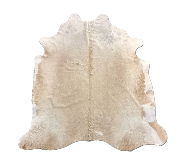 beige cowhide rug