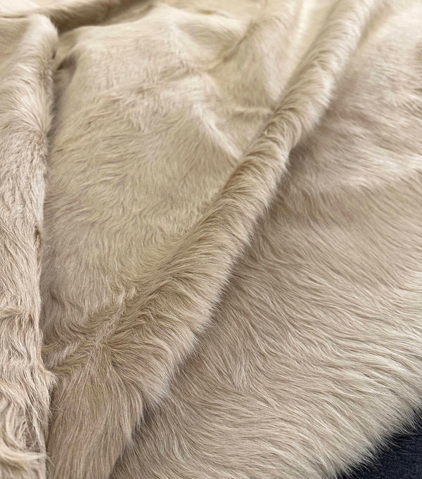 beige cowhide rug