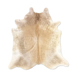 beige cowhide rug