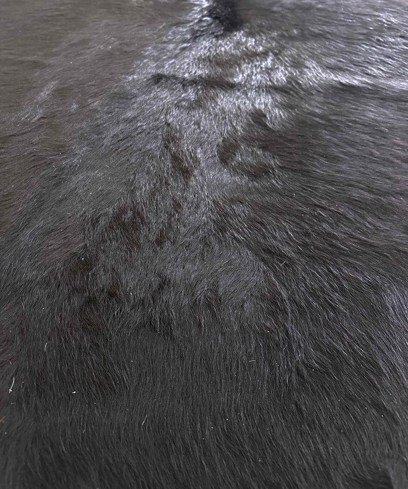 black cowhide rug