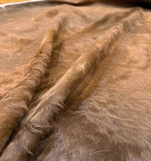 brown cowhide rug