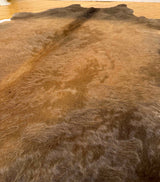 brown cowhide rug