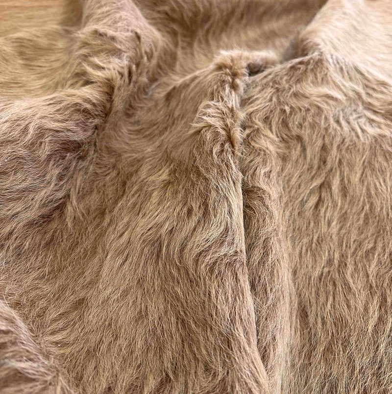 brown cowhide rug