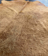 brown cowhide rug