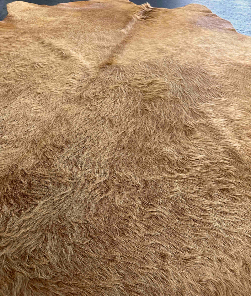 brown cowhide rug