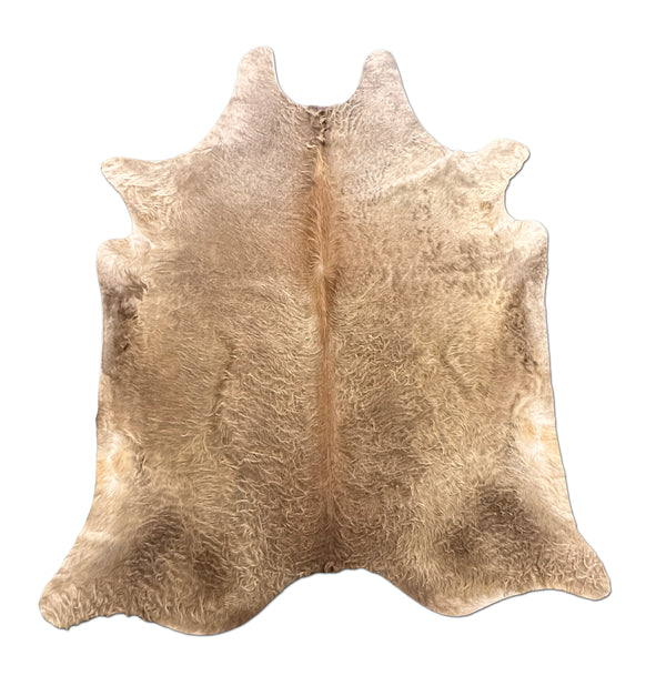 brown cowhide rug