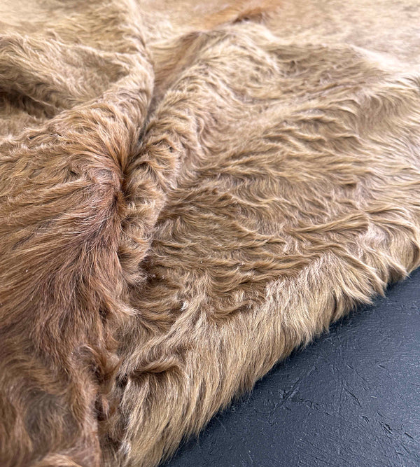 brown cowhide rug