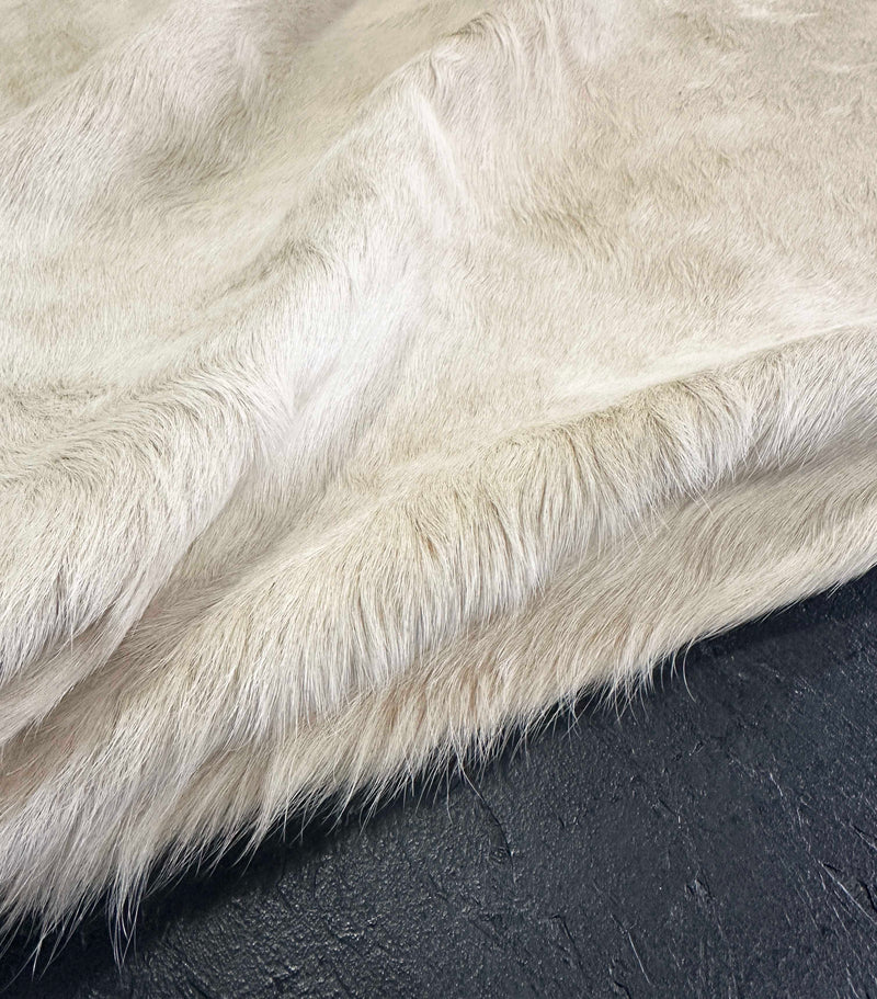 light champagne cowhide rug