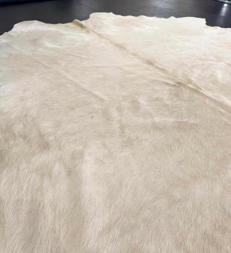 light champagne cowhide rug