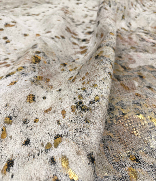 metallic gold cowhide rug