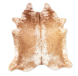 brown white cowhide rug
