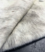 Close-up of a cowhide fur surface