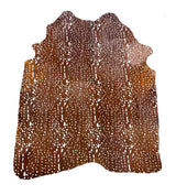 stenciled axis deer cowhide rug