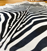 stenciled zebra cowhide rug