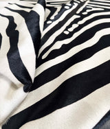 stenciled zebra cowhide rug