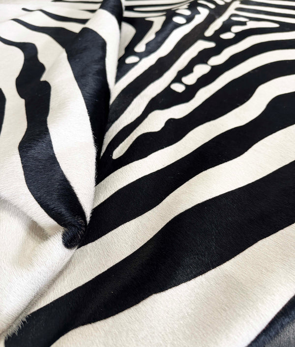 stenciled zebra cowhide rug