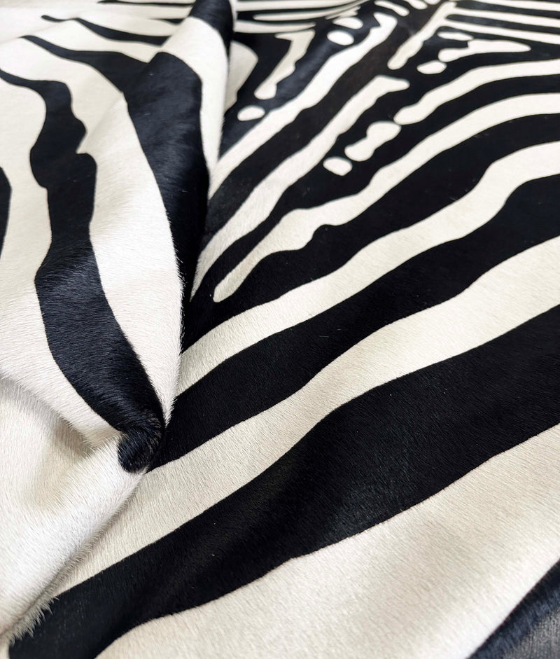 stenciled zebra cowhide rug