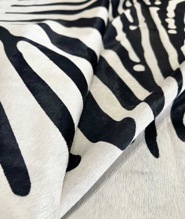 stenciled zebra cowhide rug