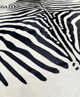 stenciled zebra cowhide rug