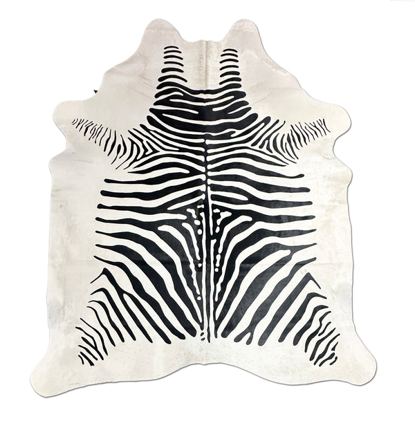 Stenciled Zebra On White Cowhide Rug