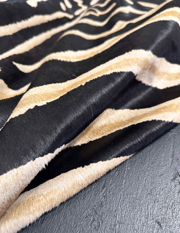 Stenciled Brown & Black Zebra On White Cowhide Rug