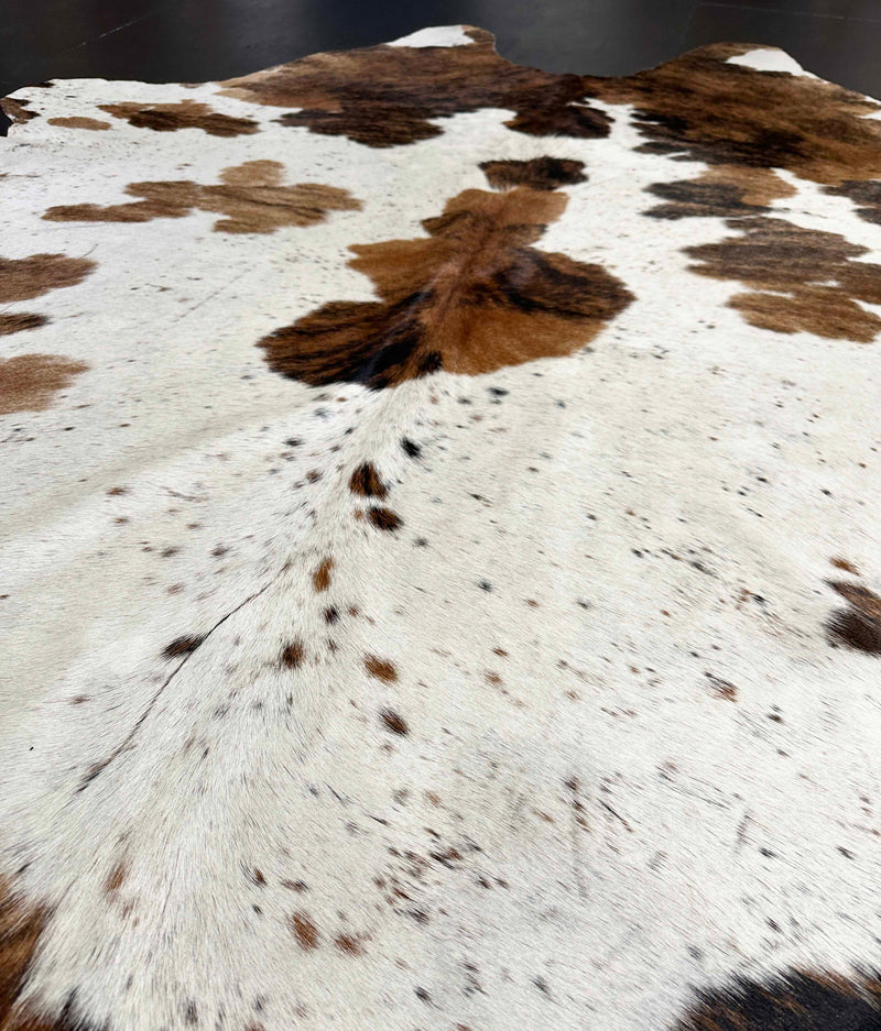tri-color cowhide rug