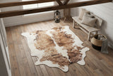 staged cowhide rug in rustic farmhouse