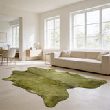 green cowhide rug in living room