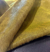 close-up of green cowhide rug