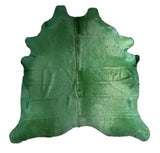 Green cowhide rug on a white background