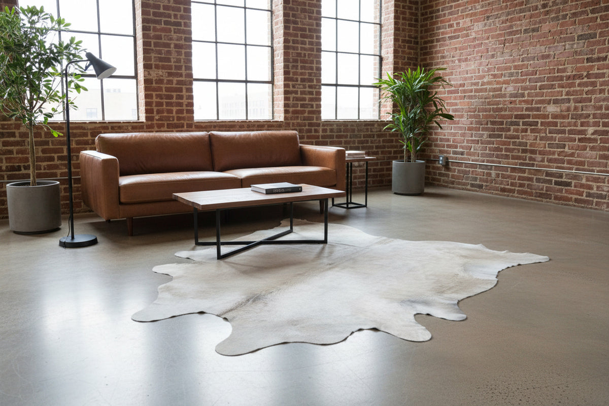 dyed gray cowhide rug in loft setting