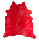 red cowhide rug