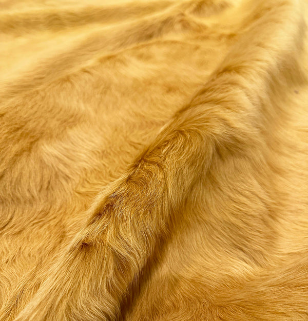 yellow cowhide rug