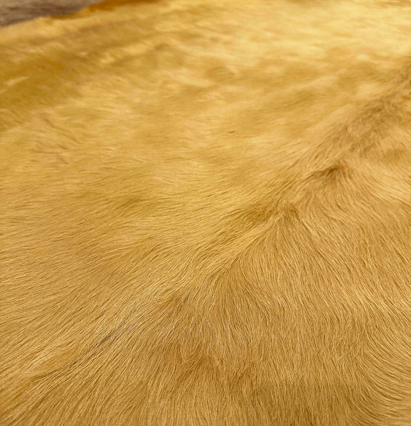 yellow cowhide rug