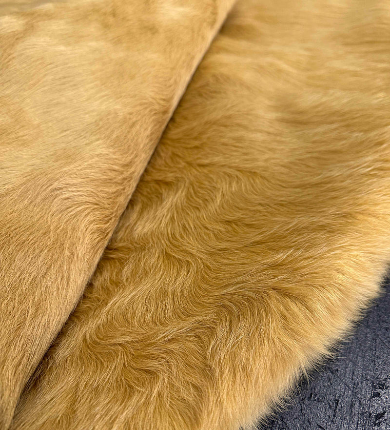 dyed yellow cowhide rug