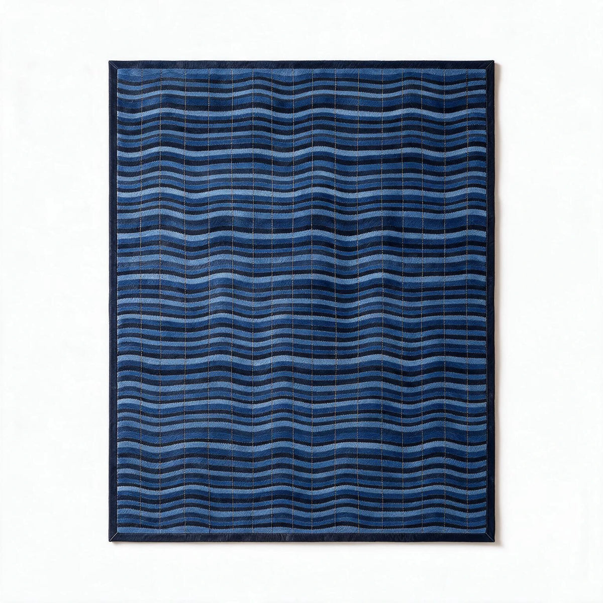 Cavo custom stitched cowhide rug visualization showing an 8-by-10-foot flowing wave pattern in layered blue tones with a narrow navy border.