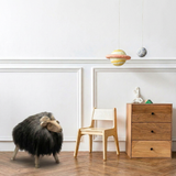 wooden sheep staged in kids room